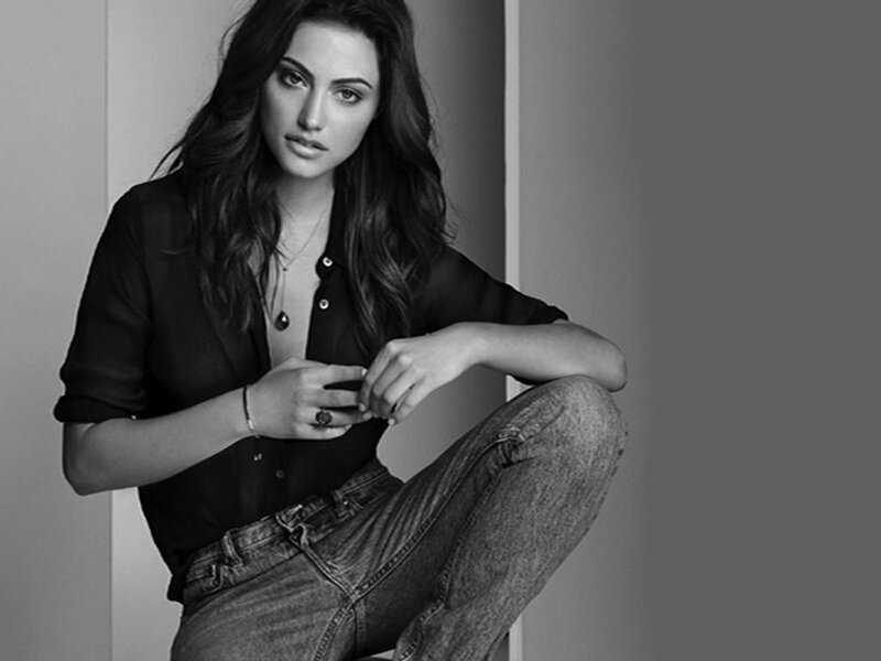 Woman in Black Shirt — Serious