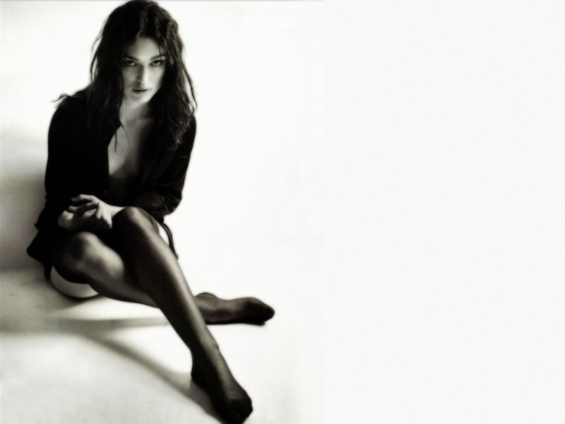 woman in black shirt sitting