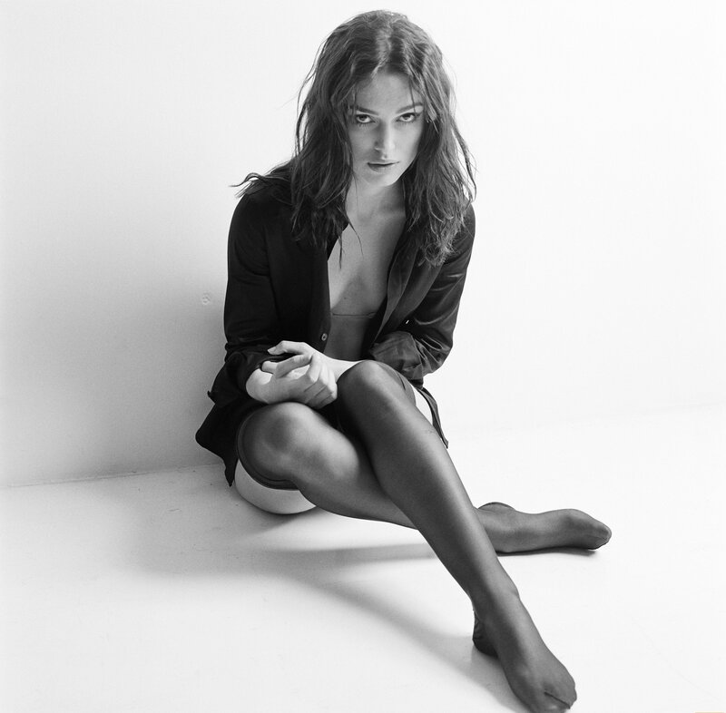 woman in black shirt sitting