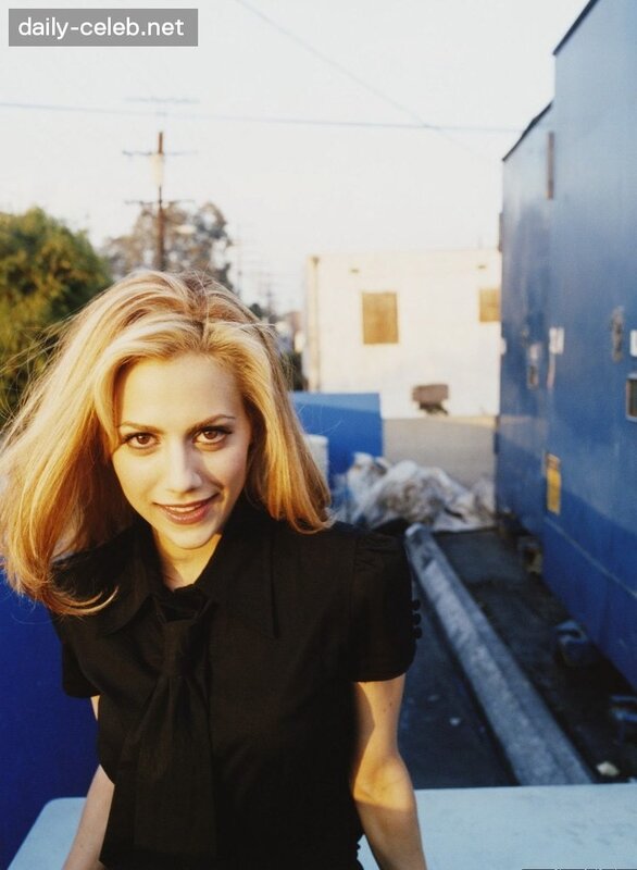 woman in black shirt smiling