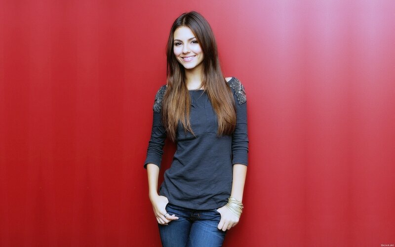 woman in black shirt smiling