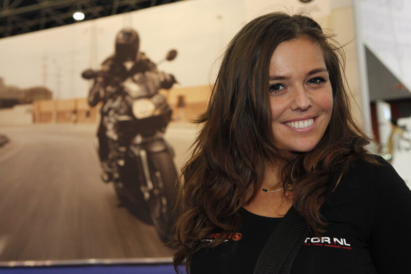 Woman in Black Shirt — Smiling, Photograph