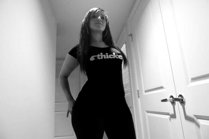 woman in black shirt standing