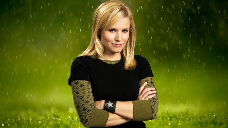 woman in black shirt with arms crossed