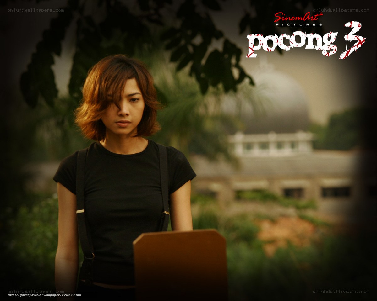 Woman in black shirt with laptop