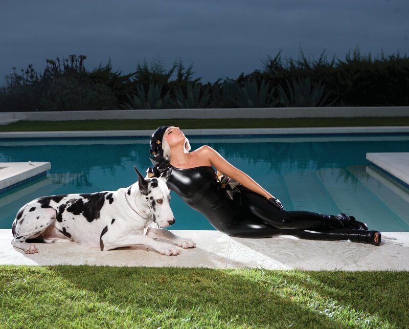 Woman in black suit by pool