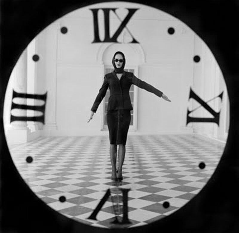 Woman in Black Suit — Dramatic, Photograph, Clock Face