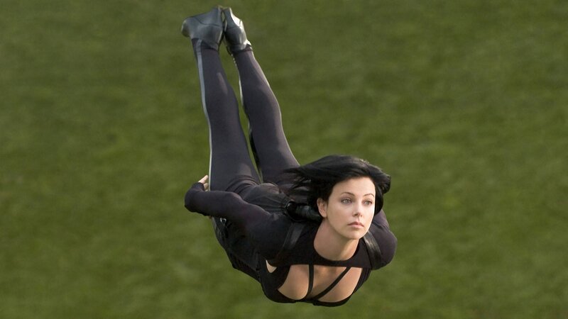 woman in black suit falling