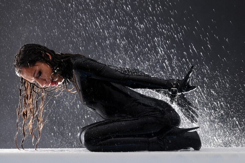 woman in black suit in rain