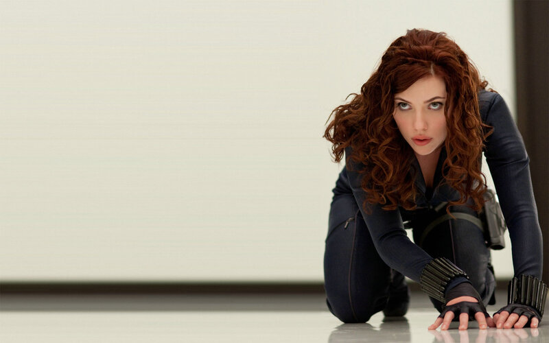 Woman in Black Suit — Intense, Photograph, Curly Hair