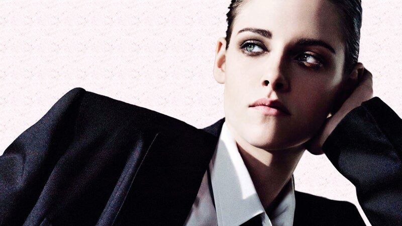 woman in black suit looking up