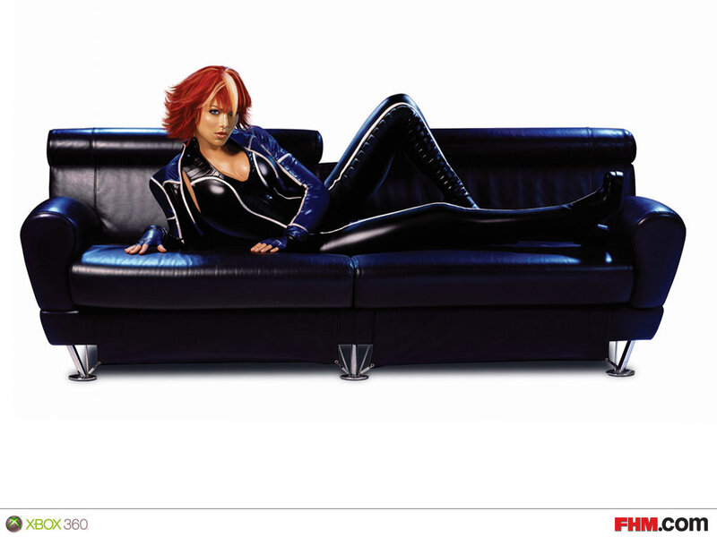 Woman in black suit on sofa