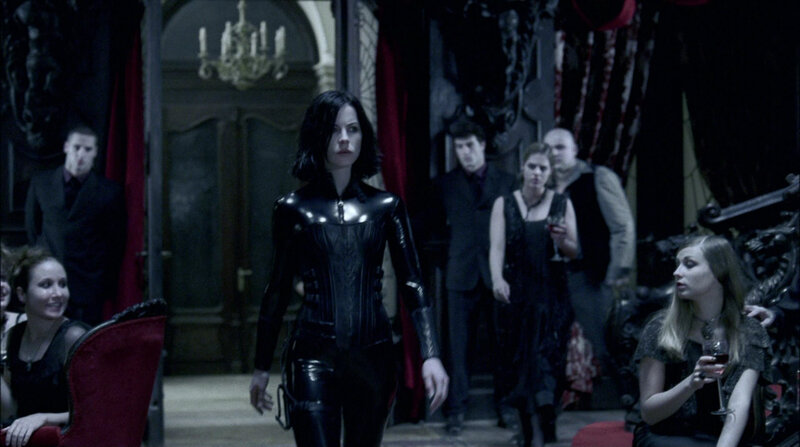 woman in black suit walking