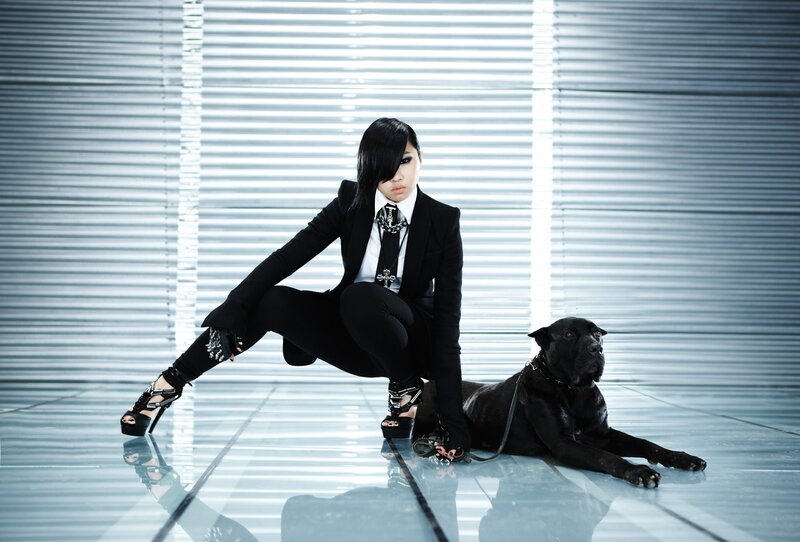 woman in black suit with dog