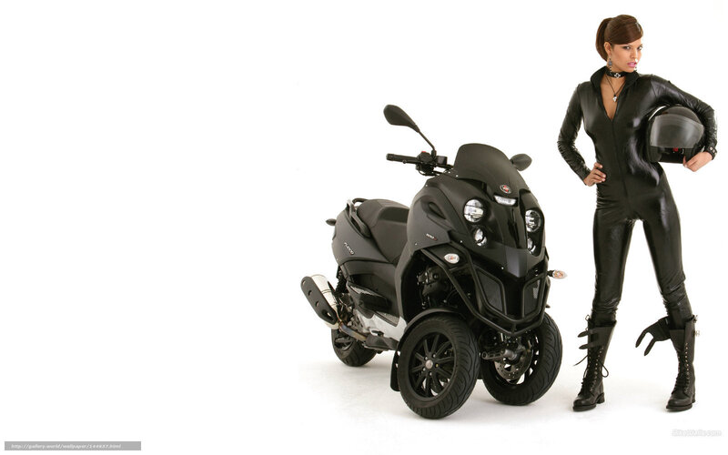 woman in black suit with scooter