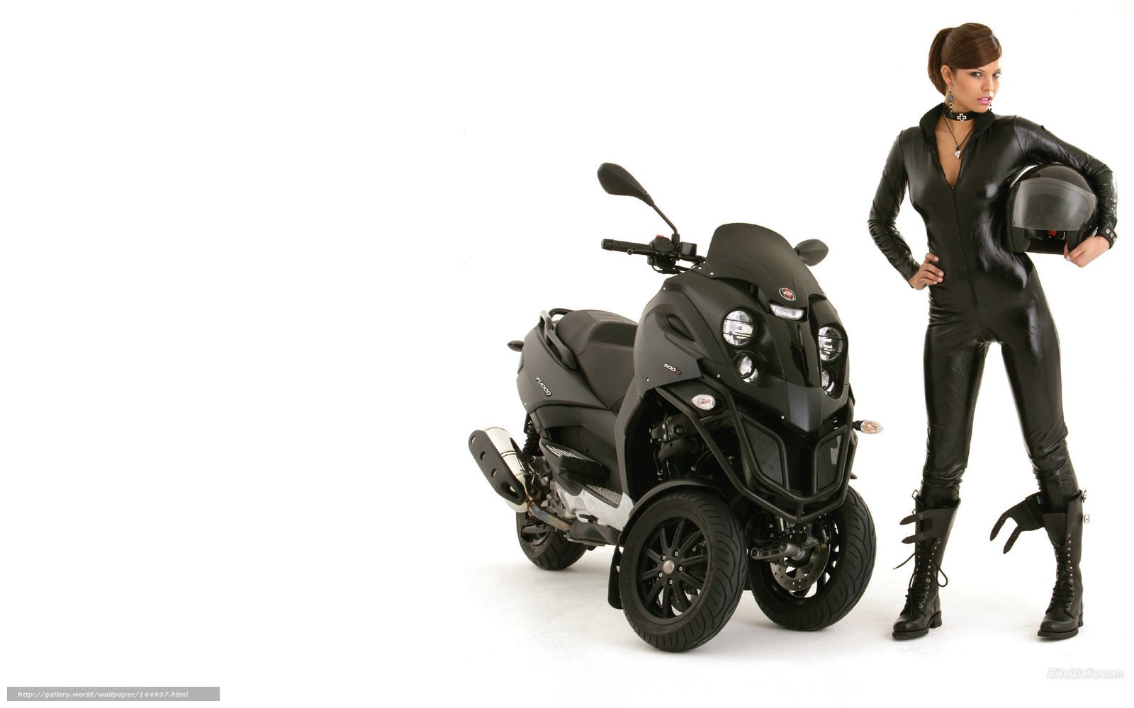 woman in black suit with scooter
