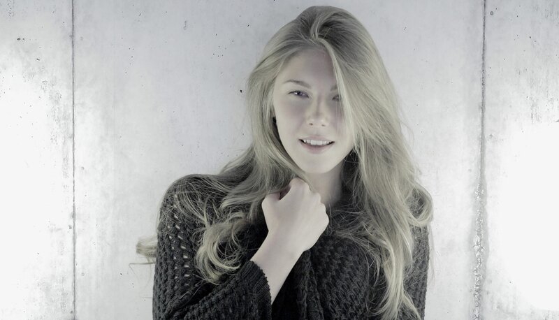 woman in black sweater