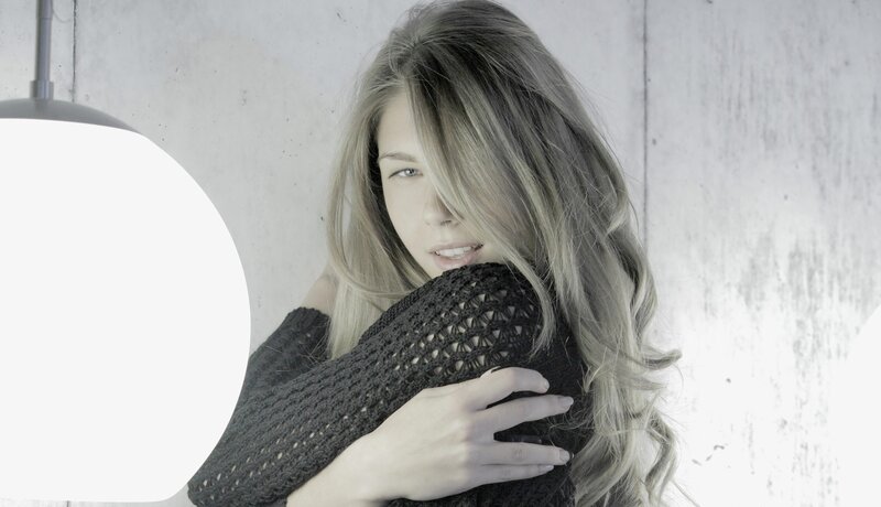 woman in black sweater