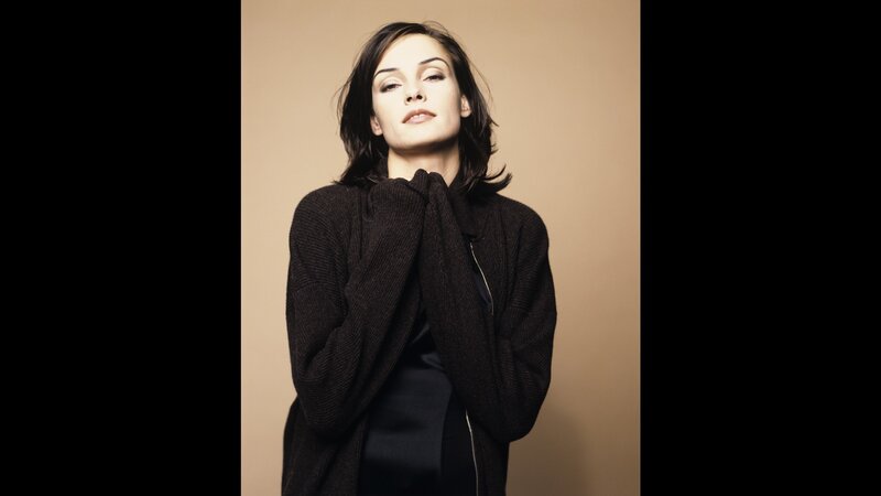 Woman in Black Sweater — Contemplative