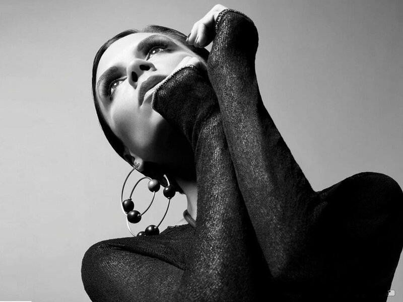 Woman in Black Sweater — Dramatic