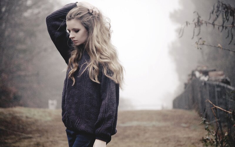 Woman in Black Sweater — Gray