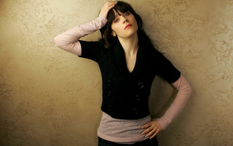 woman in black sweater posing