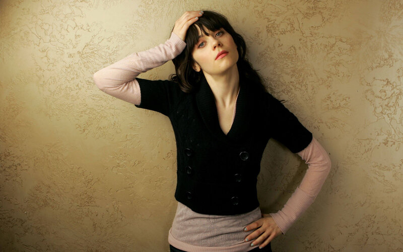 woman in black sweater posing