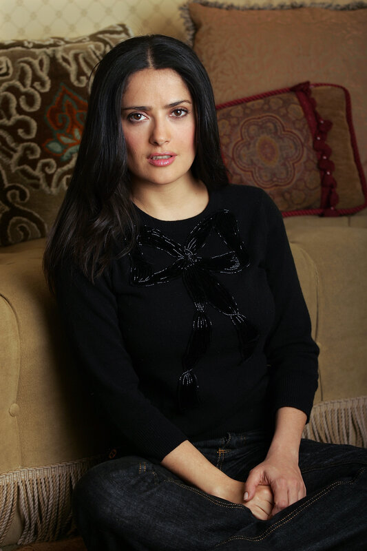 woman in black sweater sitting