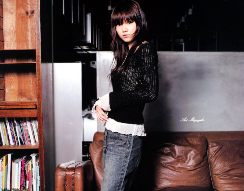 woman in black sweater standing