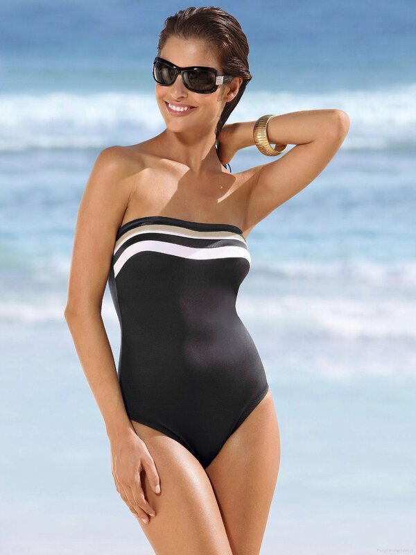 woman in black swimsuit at beach