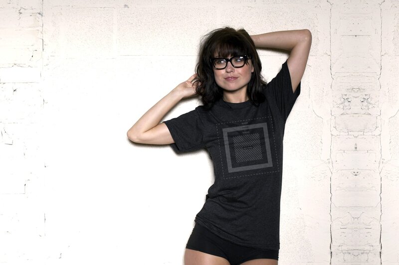 woman in black t-shirt and glasses