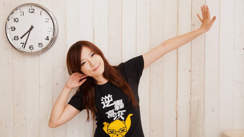 woman in black t-shirt posing