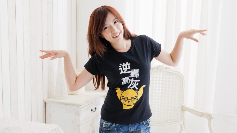 Woman in black t-shirt with cartoon