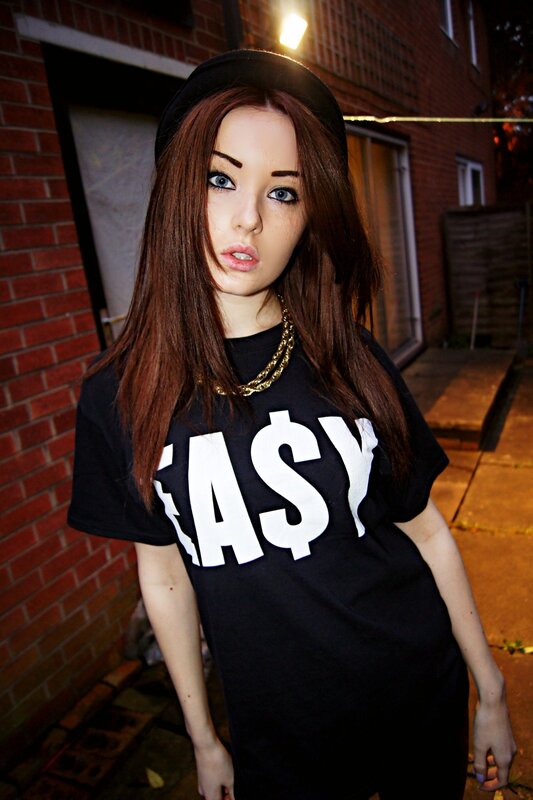 woman in black t-shirt with dollar sign