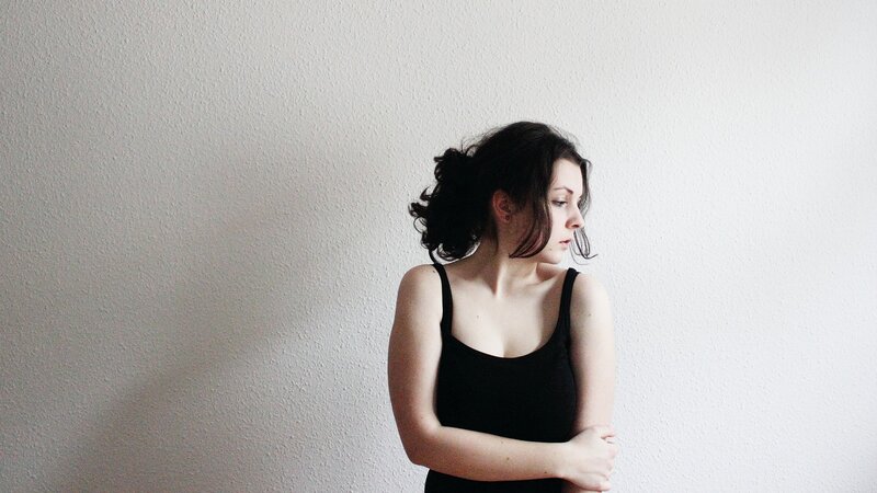 woman in black tank top