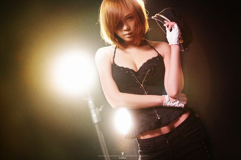 woman in black top and gloves