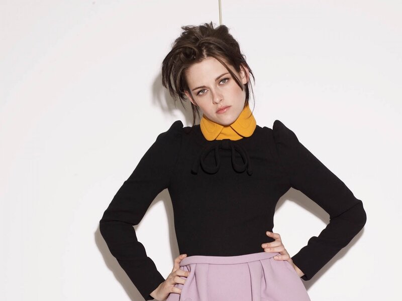 woman in black top and purple skirt