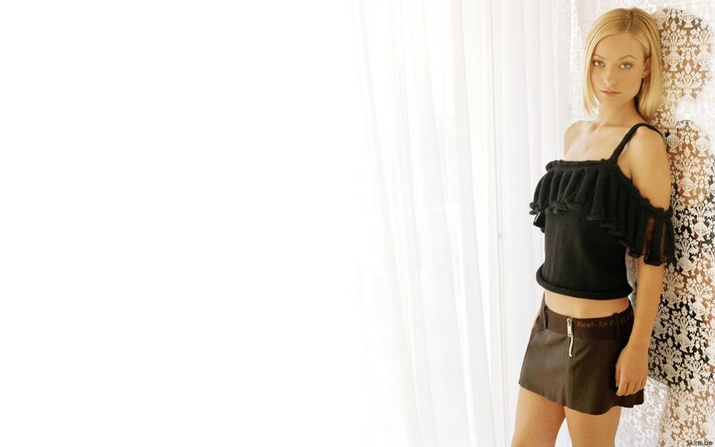 woman in black top and shorts