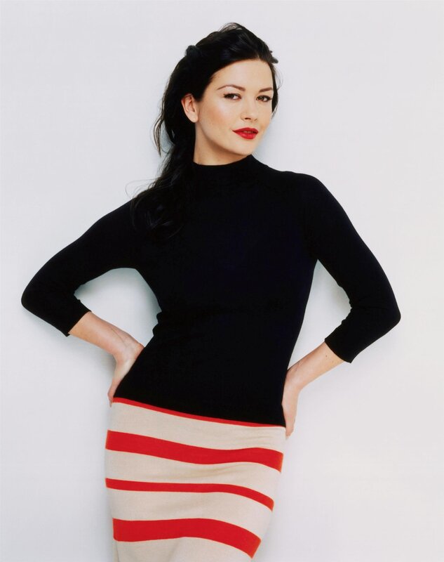 woman in black top and striped skirt