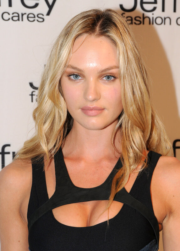 woman in black top at event