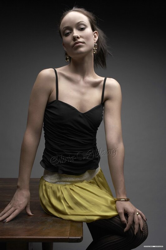 Woman in Black Top — Dramatic, Photograph, Earrings, Skirt
