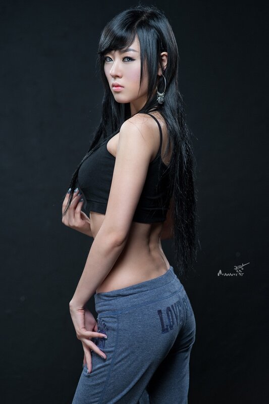 Woman in Black Top — Dramatic, Photograph, Long Hair, Earring