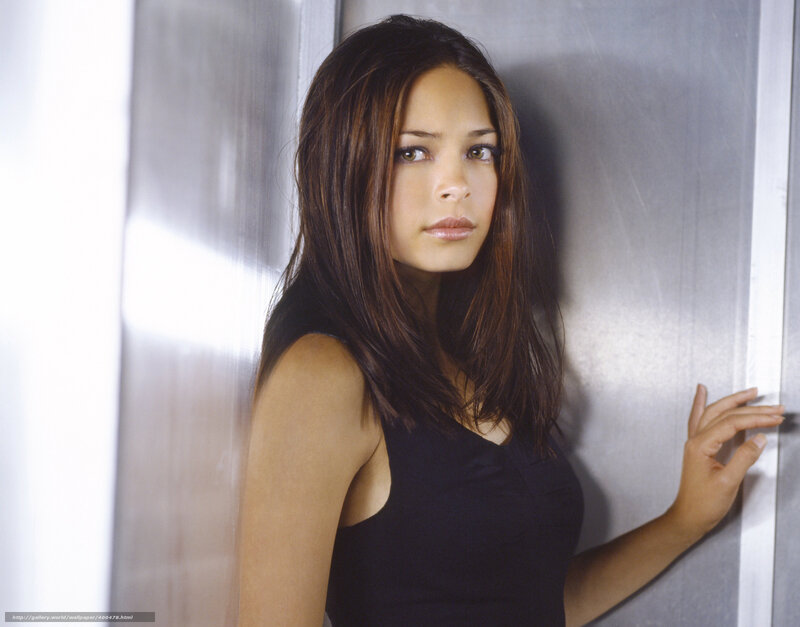 woman in black top leaning