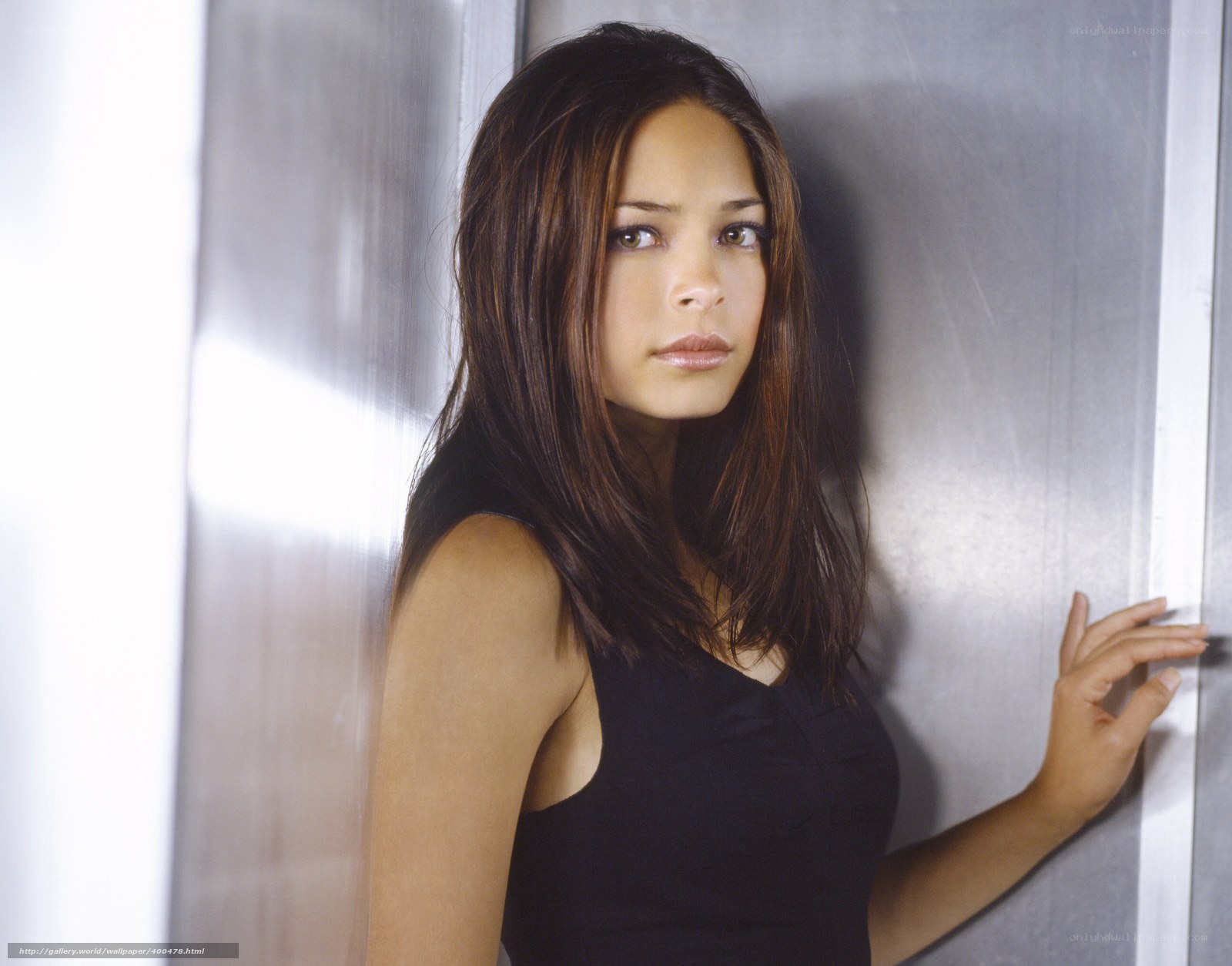woman in black top leaning