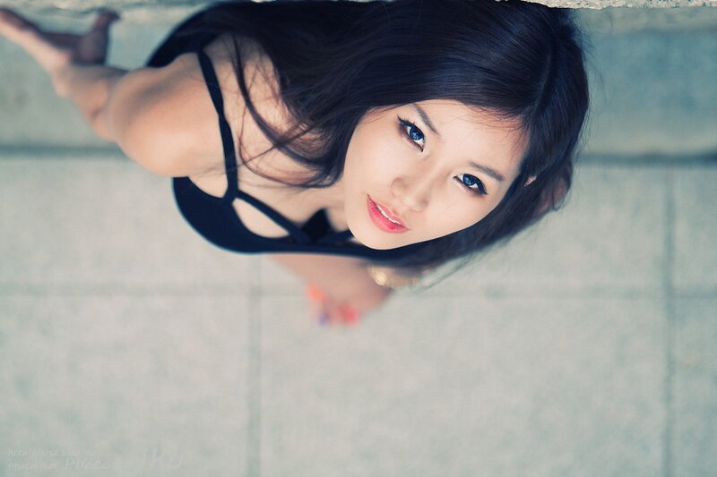 woman in black top looking up
