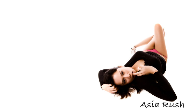 woman in black top lying down