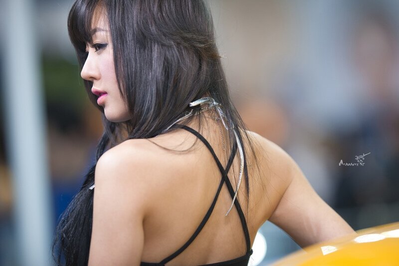 Woman in Black Top — Neutral, Photograph, Hair, Back