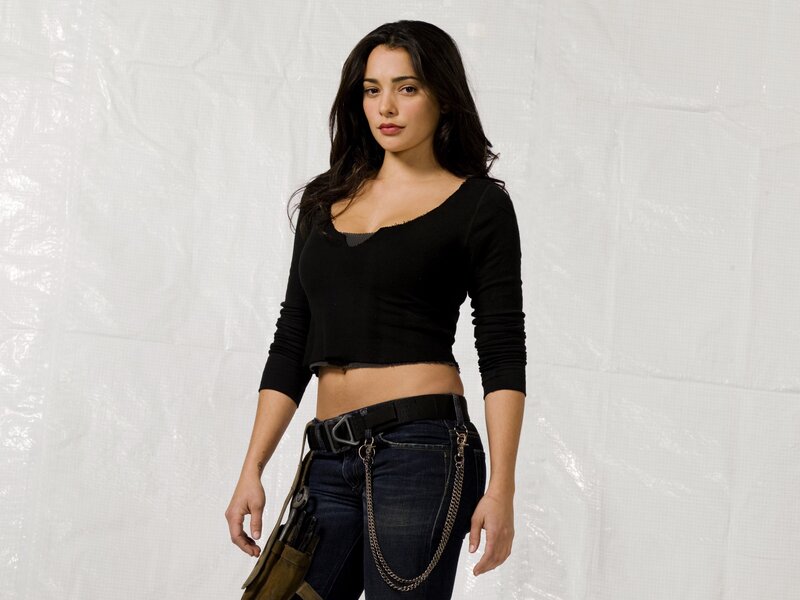 Woman in Black Top — Neutral, Photograph, Jeans, Belt, Chain