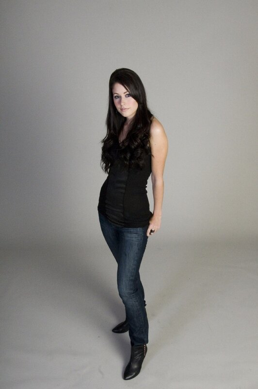 Woman in Black Top — Neutral, Photograph, Jeans, Boots, Studio Background