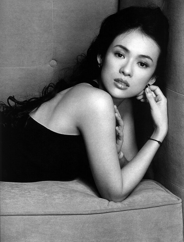 woman in black top on couch